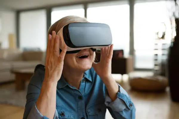 elderly woman using virtual reality